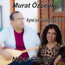 Aynaya Gülen Saçlarım